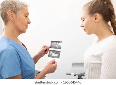 Gynecologist Explaining To A Patient A Results Of Ovarian Ultrasound. Female Health Examination, Gynecology.