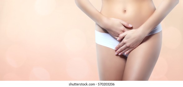 Gynecology Concept. Young Woman On Color Background