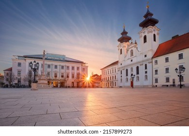 Gyor, Hungary. Cityscape image of downtown Gyor, Hungary with Szechenyi Square at sunrise.