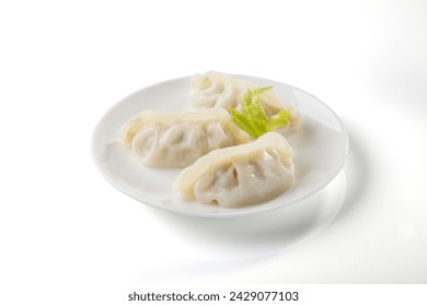 Gyoza or Steamed dumplings japanese food in white plate on white background. - Powered by Shutterstock