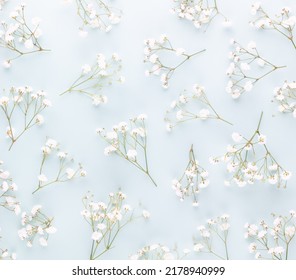 Gypsophila flowers on pastel background. Flat lay, top view, copy space. - Shutterstock ID 2178940999