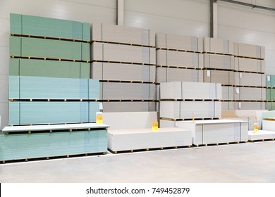 Gypsum Board Stacks At Indoor Warehouse