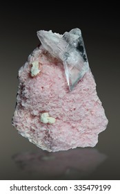 Gypsum on rhodochrosite from Romania.  - Shutterstock ID 335479199