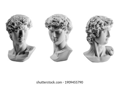 Gypsum statue of David's head. Michelangelo's David statue plaster copy isolated on white background. Ancient greek sculpture, statue of hero.