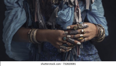 gypsy style young woman wearing tribal jewellery close up