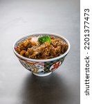 Gyudon or beef bowl. Cooked beef and onions on rice bowl., Japanese food.