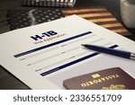 H-1b visa application concept: USA H-1B visa application on a table with a passport