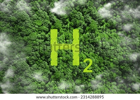 H2 eco technology Renewable Clean energy. H2 symbol on green grass in the forest. Green Energy Hydrogen. Hydrogen's environmental friendliness and Potential as a future fuel.H2 hydrogen innovation.