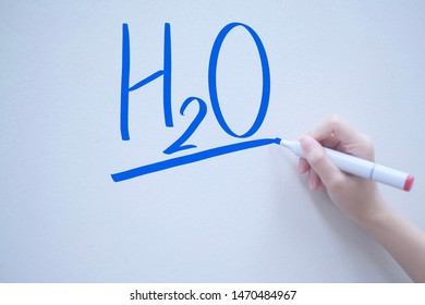 H2O Text Handwriting On Whiteboard 