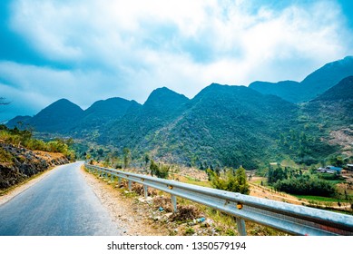 Ha Giang, VIETNAM - FEB 23, 2019: road in the mountains with soft sky on the background at Ha Giang province, Viet Nam