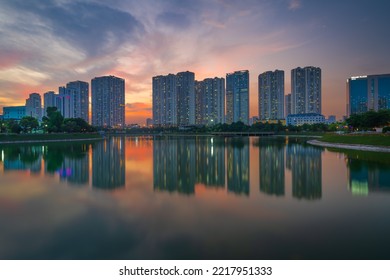 Ha Noi, Vietnam, October 07 2022: Illuminated Modern Apartments, As Known As A Part Of Urban Life, Are Reflected At Sunset Moment.