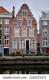 Haarlem, Holland, May 23, 2022: Historic canal house in Haarlem with stepped gable facade.