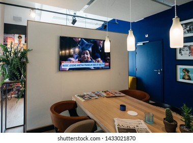 Haarlem, Netherlands - Aug 17, 2018: Modern Hotel Lobby With Digital Flat Screen Tv Showing CNN News Channel With Braking News Music Legend Aretha Franklin Dies At Age 76 - Singing At Obama