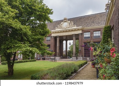 Haarlem, Netherlands, August 5, 2016: The entrance of the almshouse the green garden in the old center of Haarlem in the Netherlands