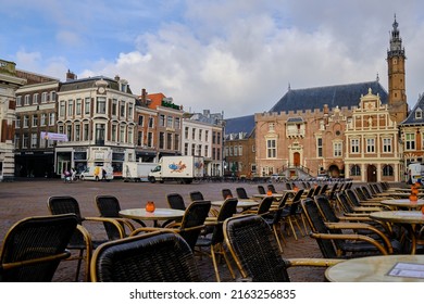 Haarlem, Netherlands - May 24. 2022: Lines of empty tables in the main market square (Grote Markt) in the city center of Haarlem.