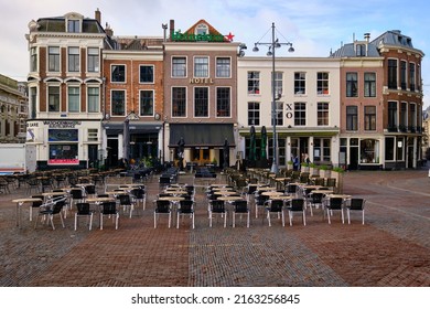 Haarlem, Netherlands - May 24. 2022: Lines of empty tables in the main market sqaure (Grote Markt) in the city center of Haarlem.