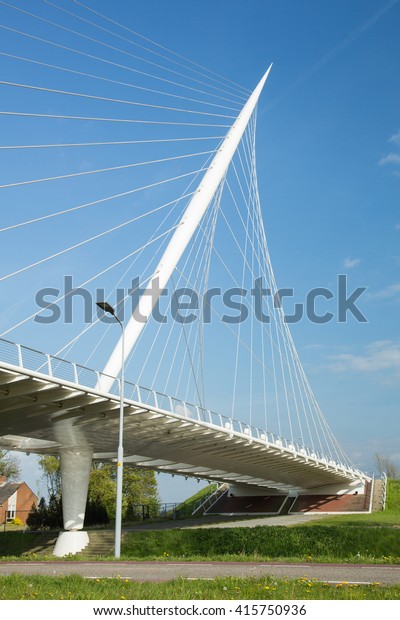 HAARLEMMERMEER, THE NETHERLANDS - May 04,\
2016 - Calatrava Bridge Harp is one of three bridges in the \
Haarlemmermeer, the Netherlands\
Photo taken on May 04,\
2016