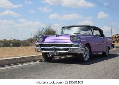 HABAN, CUBA - Feb 14, 2012: A Vintage Classic Ford Car On The Road