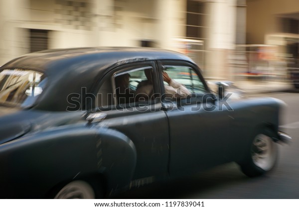 Habana, Cuba - 10 January, 2017:Old American cars\
on the road in Cuba.