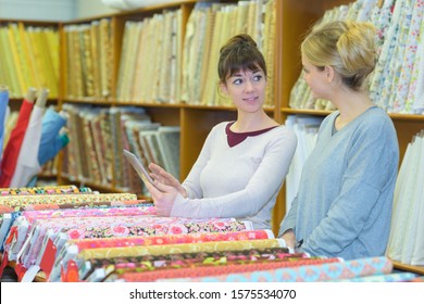 A Haberdasher Assisting A Client