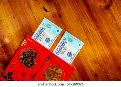 Habit, Custom Of Vietnamese On Tet Is Lucky Money, A Vietnam Traditional Culture, Child Wish Somebody A Happy New Year, Receive Red Envelope With New Small Change, Tet On Spring, Also Lunar New Year