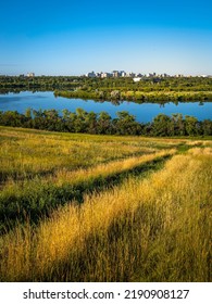 Habitat Conservation Area And Cityscape At Sunrise Over Wascana Lake And Prairie In Regina, Saskatchewan, Canada