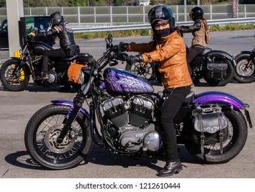 HACHIOJI, JAPAN - OCTOBER 20TH, 2018. Woman Riding Harley Davidson Motorcycle At Chuo Expressway, Japan.