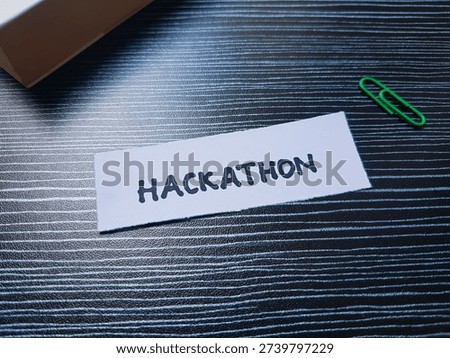Hackathon writting on table background. 