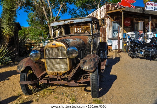 HACKBERRY, AZ - MAY 15: A\
vintage car left abandoned near the Hackberry General Store on May\
15, 2013. Hackberry General Store is famous stop on the historic\
Route 66