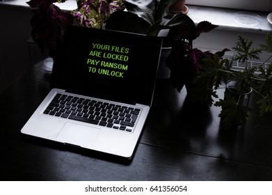 Hacked By Ransomware With Your Files Are Locked Pay Ransom To Unlock Files Message, Concept Photo Of Ransomware Showing How Anyone Could Be Hacked And Is Potentially Vulnerable.