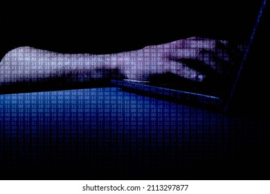 Hacked (DARK) - Hands at computer with binary code overlay with the word 'HACKED' at centre of image