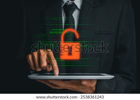 A hacker accessing sensitive data on a tablet, symbolizing cybersecurity threats and digital vulnerabilities.