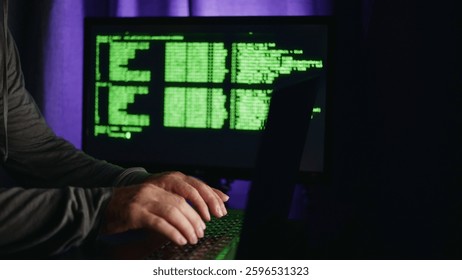 Hacker approaches computer and enters code to conduct cyber attack and hack bank account Hacker's hands enter malicious code that is displayed on the monitor Concept of hacker-cracker, side view