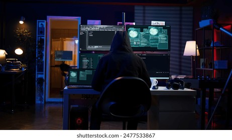 Hacker arriving in secret base with laptop, ready to start programming viruses. Scammer in criminal den opening notebook to exploit network servers and bypass security measures, camera B