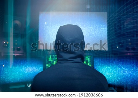 Hacker coding virus ransomware using laptops and computers. Cyber attack, system breaking and malware concept.