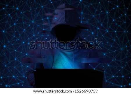 Hacker with a computer on the background of the Internet network.  Glitch effect screensaver.  Darknet.