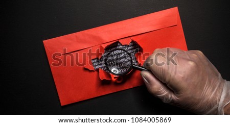 The hacker cracked the binary encryption code and reads the cipher via a magnifying glass