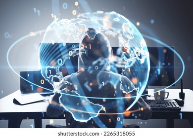 Hacker at desktop using computers with glowing globe hologram. Global hacking, crime and phishing concept. Double exposure