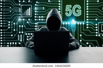 Hacker at desktop using laptop with abstract 5G circuit interface on dark background. Internet speed concept. Multiexposure 