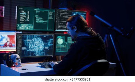 Hacker drinking coffee while running artificial intelligence spyware software designed to gather information from users. Script kiddie doing illegal stuff using AI, consuming beverage, camera B