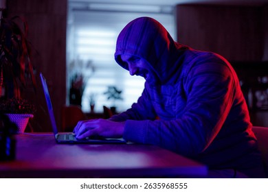 Hacker engaged in intense activity at night in a dimly lit room - Powered by Shutterstock - Get 15% off with code: PIKWIZARD15