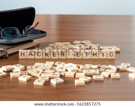 hacker ethic concept represented by wooden letter tiles