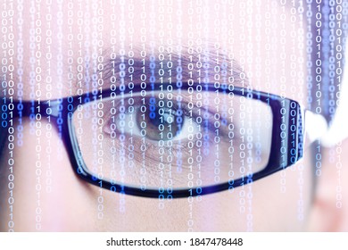 Hacker Eye With Glasses. Reflection Of Computer Code In Glasses.