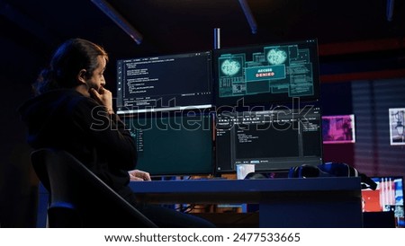 Hacker getting access denied error while doing computer sabotage using ransomware. Cybercriminal failing to penetrate firewalls while trying to steal victim data, camera B
