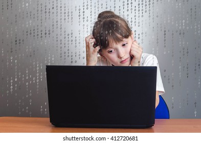 Hacker Girl thinking while sitting in the laptop and scratches his head