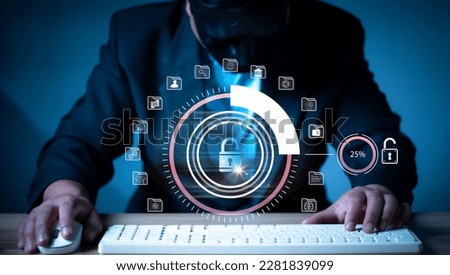 Hacker hacks network, cybersecurity vulnerability and hacker,coding,malware concept.Hooded computer hacker in cybersecurity vulnerability , metaverse digital world technology.