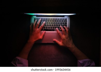 Hacker Hand Stealing Data From Laptop Top Down 