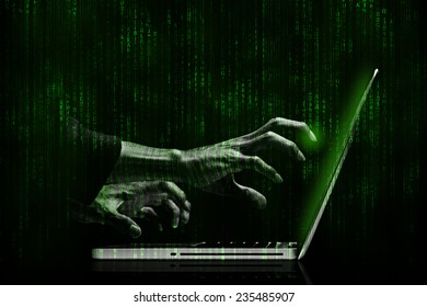 hacker hands with binary codes on monitor 