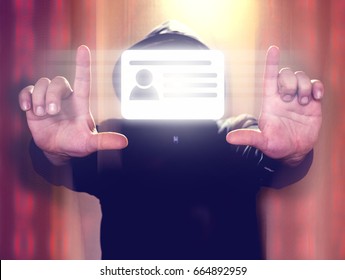 Hacker Holding Virtual Screen With Id Card Icon. Cyber Security Or Id Theft Concept