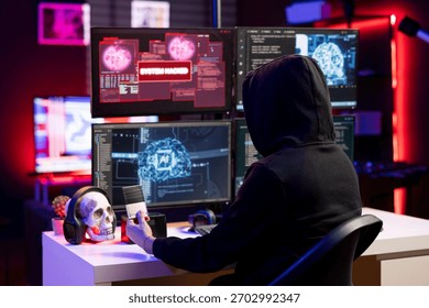 Hacker looking at SSD with malware on computer, using it to break into systems and access restricted data. Cybercriminal uploads storage drive with stolen sensitive information, using VPN on dark web